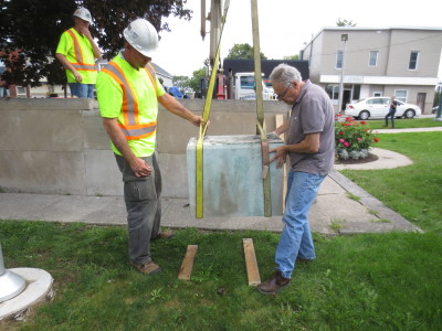 With the sculpture secured on the truck, the block of stone that seated the statue was removed for further assessment.