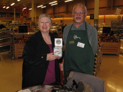 Manager Nadine Kennedy and David Hinks looking after the Food Bank's table at Steve’s Independent in Carleton Place. 