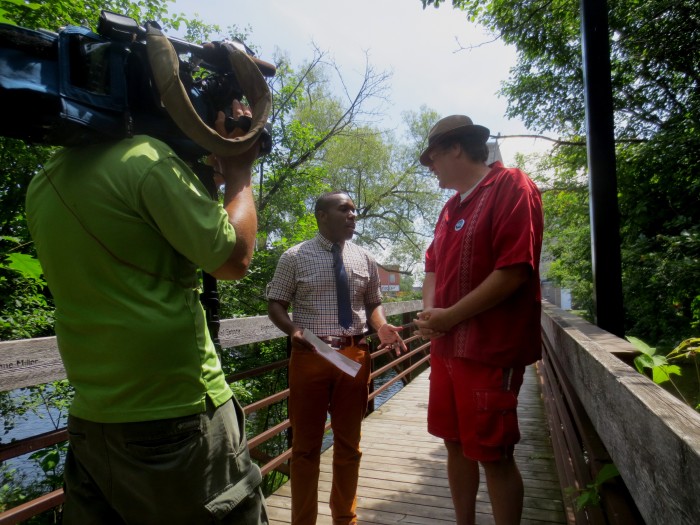 Nathan Rudyk (right) is interviewed by CTV reporter Stefan Keyes along Almonte’s popular Riverwalk.  