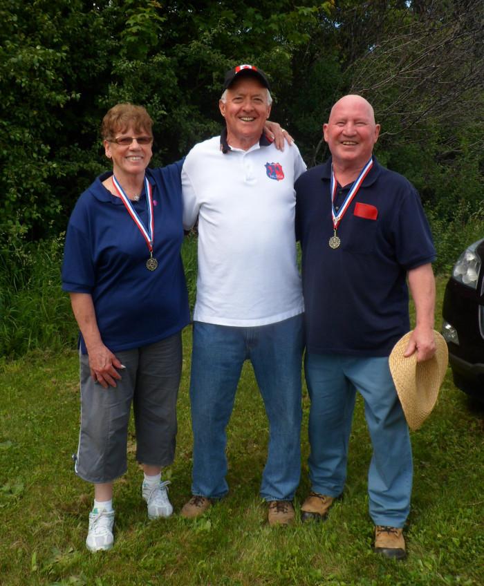 bocce gold medals are Evelyn Neil and Ben Burger with convenor  Richard Fitzgibbon.